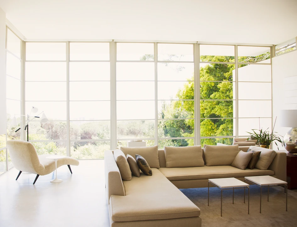 a living room with large windows